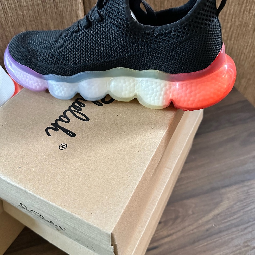 Black and Red Sneakers with Bold Sole Design